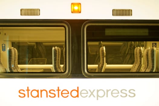 London,United Kingdom – April 01,2015: The side view of the Stansted Express train running between the airport and the City of London on 31 March 2015 in London.