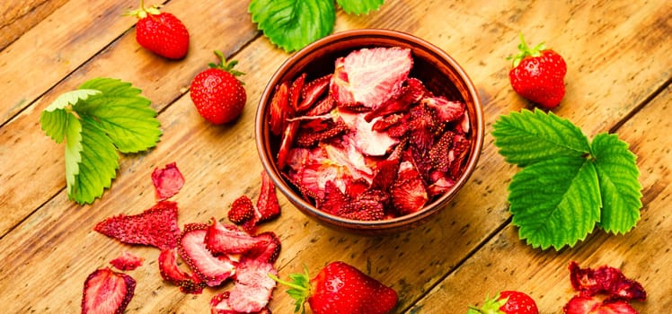 Dried summer berry,fruit dessert.Strawberry chips,berry sweetness in bowl