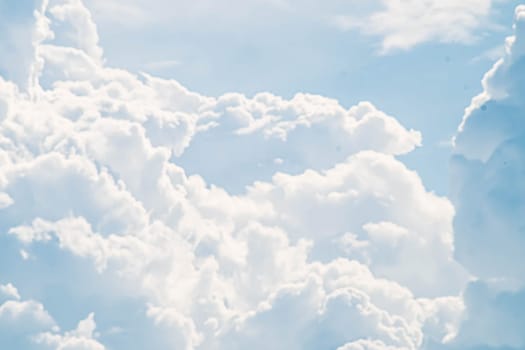 Beautiful white fluffy clouds sky background with blue sky background for copy space