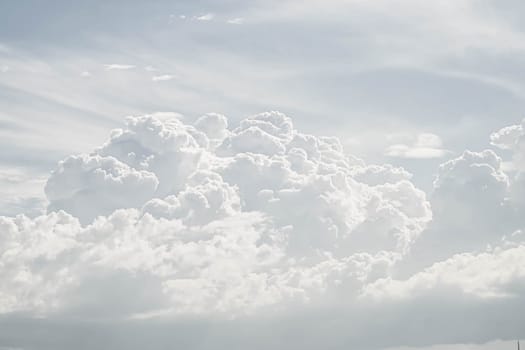Beautiful white fluffy clouds sky background with blue sky background for copy space
