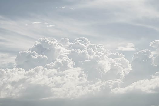 Beautiful white fluffy clouds sky background with blue sky background for copy space