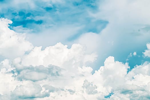 Beautiful white fluffy clouds sky background with blue sky background for copy space