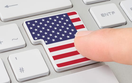 A keyboard with a labeled button - Flag of the United States of America