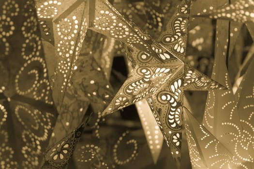 Beautiful shiny star mood lamp in merry advent decoration. Traditional symbol of the best miracle time of the year. Part of series.