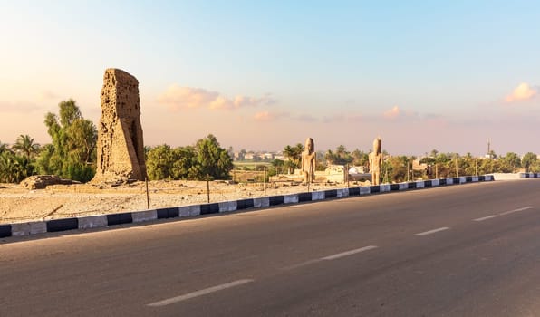 Road to the Valley of Kings and ancient Egyptian statues and tombs on the way, Luxor.
