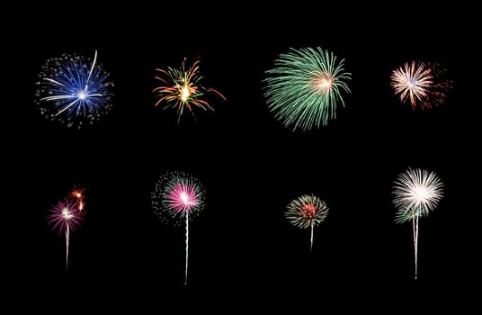 Collection of colorful festive eight fireworks exploding over night sky, isolated on black background