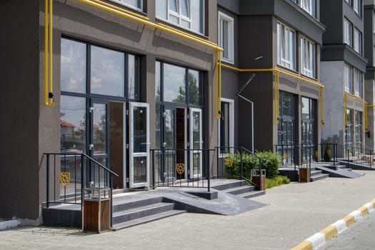 Construction primarily for shops, offices and commercial premises. Sale and rental of real estate in the reference building. The apartment is on the ground floor. Ukraine, Kiev - August 19, 2021