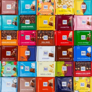 Stuttgart, Germany - March 1, 2021: Ritter Sport chocolate chocolates different types variety background square in Germany.