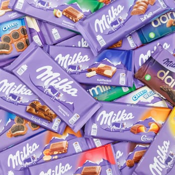 Stuttgart, Germany - March 3, 2021: Milka chocolate chocolates different types variety background square in Germany.
