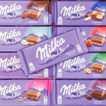 Stuttgart, Germany - March 3, 2021: Milka chocolate chocolates different types variety background square in Germany.