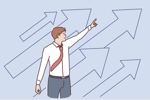 Business development and success concept. Young positive businessman standing pointing up with arrows feeling confident with growth and development vector illustration
