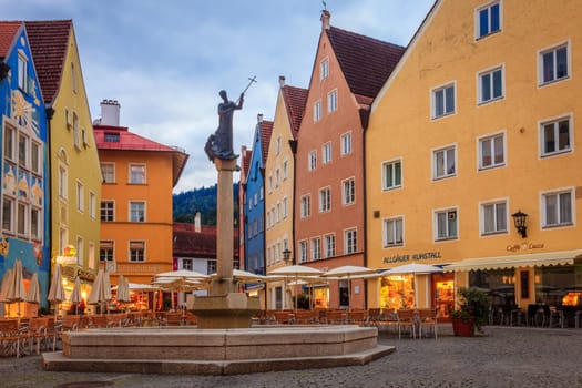 Fussen, Germany, September 27, 2015: Central square in Fussen featuring a landmark fountain - Stadtbrunnen