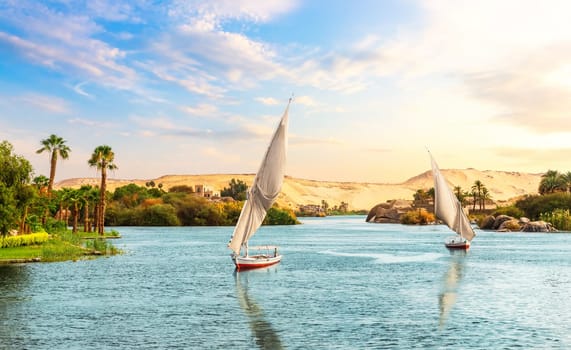 Aswan in Egypt, beautiful Nile view with sailboats.