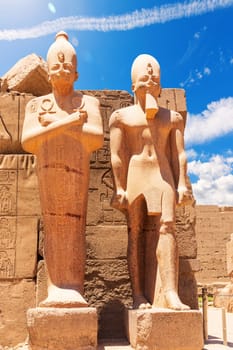 Ancient Statues of Thutmes III, Karnak Temple Pylon, Luxor, Egypt.