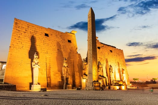 Pylon with obelisk in Luxor Temple, beautiful evening view, Egypt.