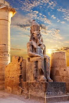 Statue of Seated Rameses II in Luxor Temple, Egypt.