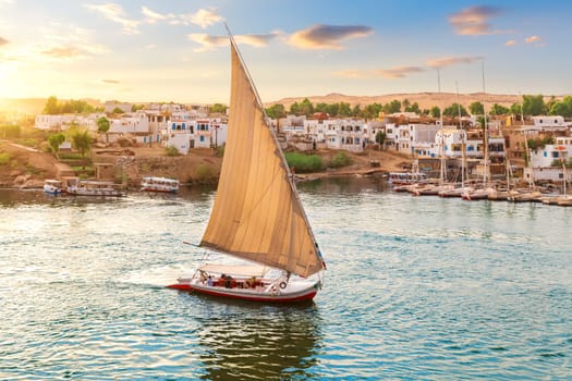 Felucca on the Nile near the banks of Aswan, Egypt.