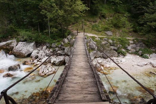 Hanging bridge on the Soca Trail crossing Soca River, Slovenia 2020