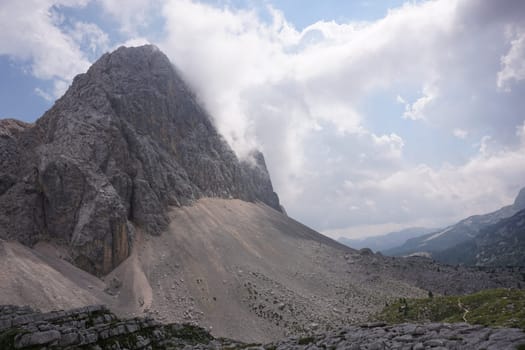 Mountain peak half covered by clouds on the Seven Lakes Valley hike, Slovenia 2020