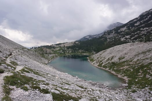 Winding path along one of the lakes on the Seven Lakes Valley hike, Slovenia 2020