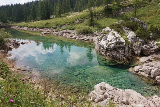 Reflection on a natural pond, Seven Lakes Valley Hike, Slovenia 2020