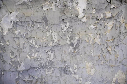 Detail of old damaged and ruined paint, abandonment and passage of time