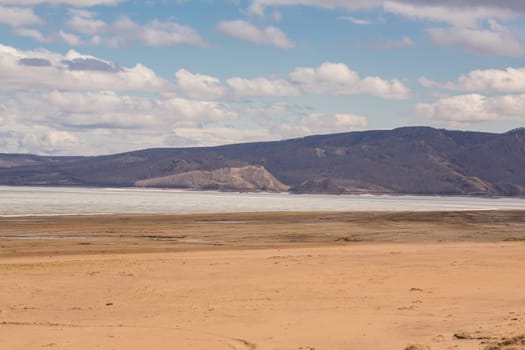 A sandy beach on the bank of the Yenisei River.Republic of Khakassia