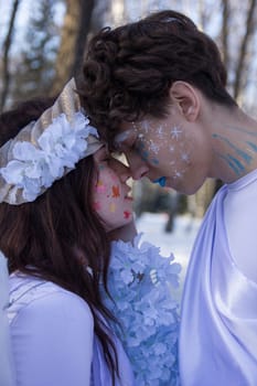 Fine art imagery. Woman and angel man embracing