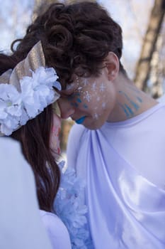 Fine art imagery. Woman and angel man embracing