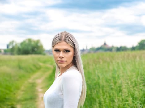 sensual young woman on a meadow