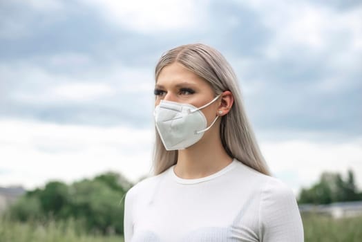 young blond woman with mask