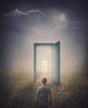 Teleportation doors concept. Rear view of a person standing in front of a doorway in the land, as seen in the mirror like a portal to another world. Magical and surreal scene with spooky lightnings