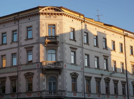House in Pula - windows reflecting the last sunlight, Croatia 2020