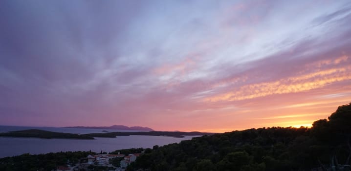 Beautiful sunset view over the town of Hvar, Hvar Island, Croatia 2020