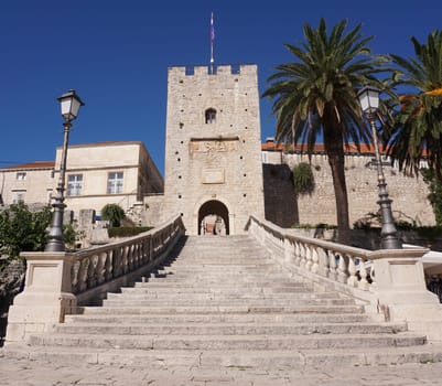 Stairs leading to gate of Korcula, entrance to the walled old town, Croatia 2020