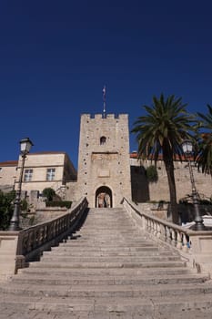 Stairs leading to gate of Korcula, entrance to the walled old town, Croatia 2020