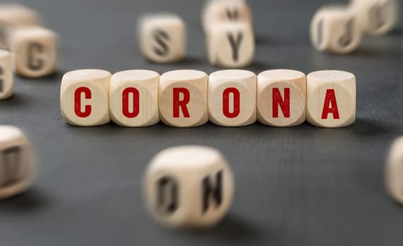 Letter dice with the word Corona