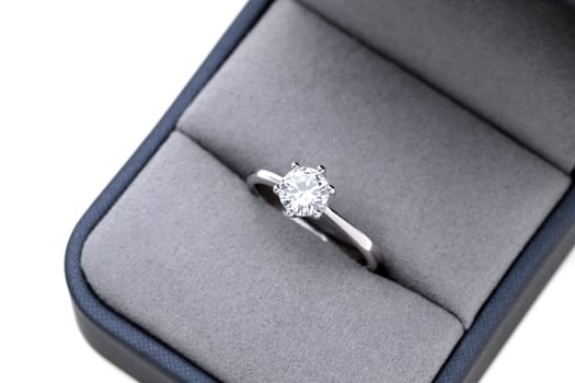 Close up of elegant diamond ring in the box, Love and wedding concept