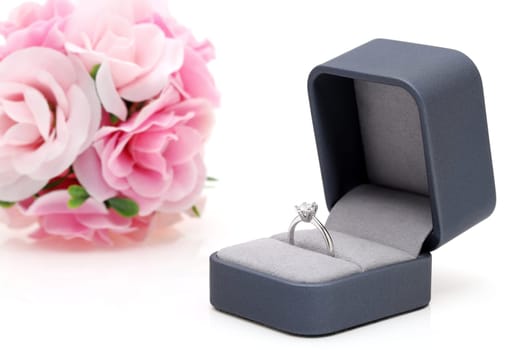 Close up of elegant diamond ring in the box, Love and wedding concept