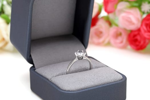 Close up of elegant diamond ring in the box, Love and wedding concept