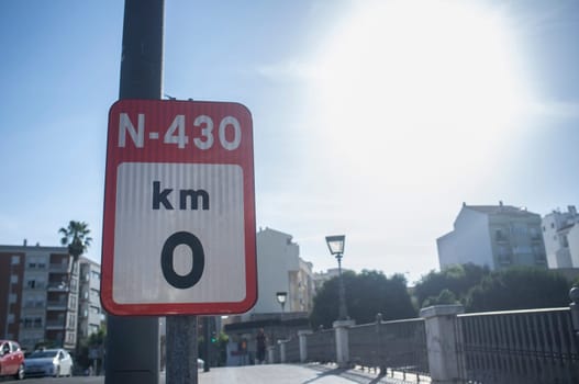 Badajoz, Spain - June 14th, 2018: Zero kilometer of Spanish National N-430 Road. Urban sing post