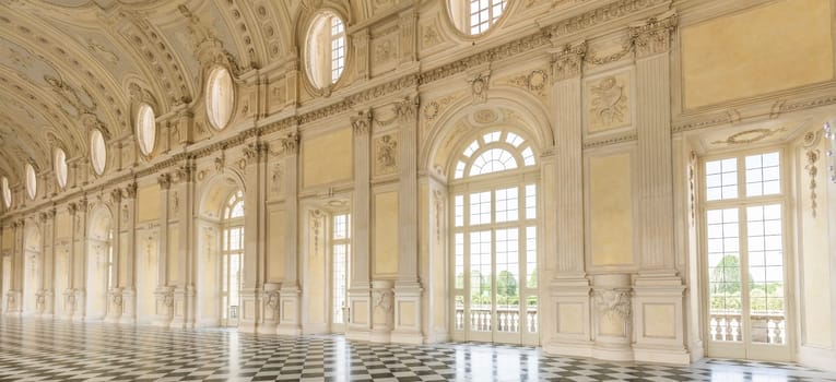 VENARIA REALE, ITALY - CIRCA MAY 2021: corridor with floor made of luxury marbles. Plenty of elegance for this Italian interior in Venaria Reale, Piedmont region.