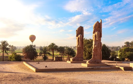 Colossal statues near Mortuary Temple of Thutmose III, Luxor, Egypt.