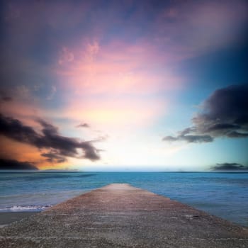The path to nice sea beach in sunset sunshine with beautiful sky