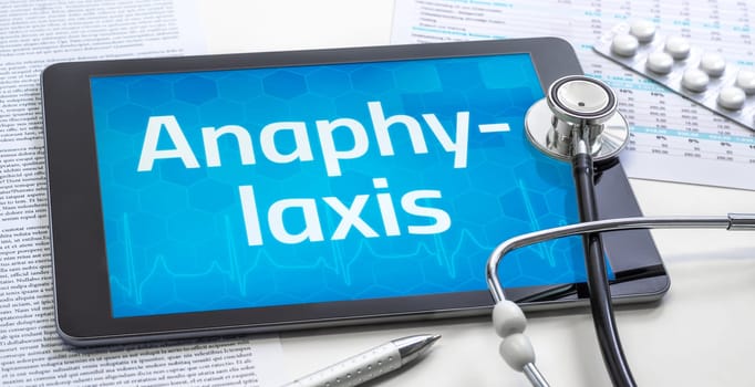 The word Anaphylaxis on the display of a tablet