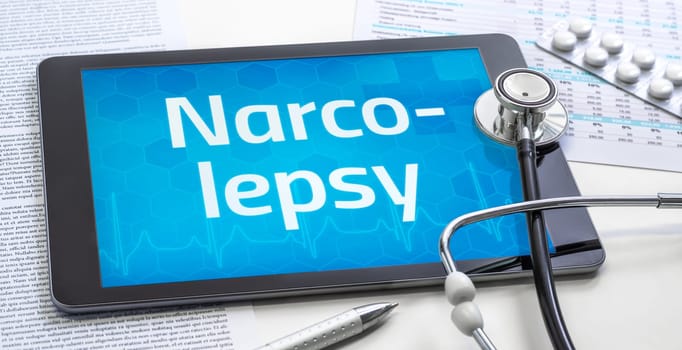 The word Narcolepsy on the display of a tablet