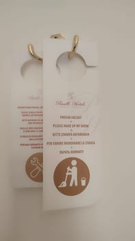 October 15 2024 Prague Czech Republic Europe Room service sign clean room simbol logo door handle bad white paper letter. High quality photo