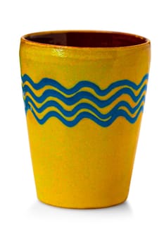 The Crafted handmade yellow cup isolated on white background