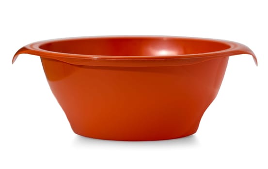 The empty round plastic red plate on white background
