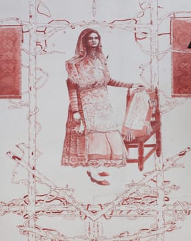 Acebo, Spain - Jun 13th, 2021: Memorial wall painting to encajeras or Bobbin lace women artisans at Acebo Main Square, Sierra de Gata, Caceres, Extremadura, Spain